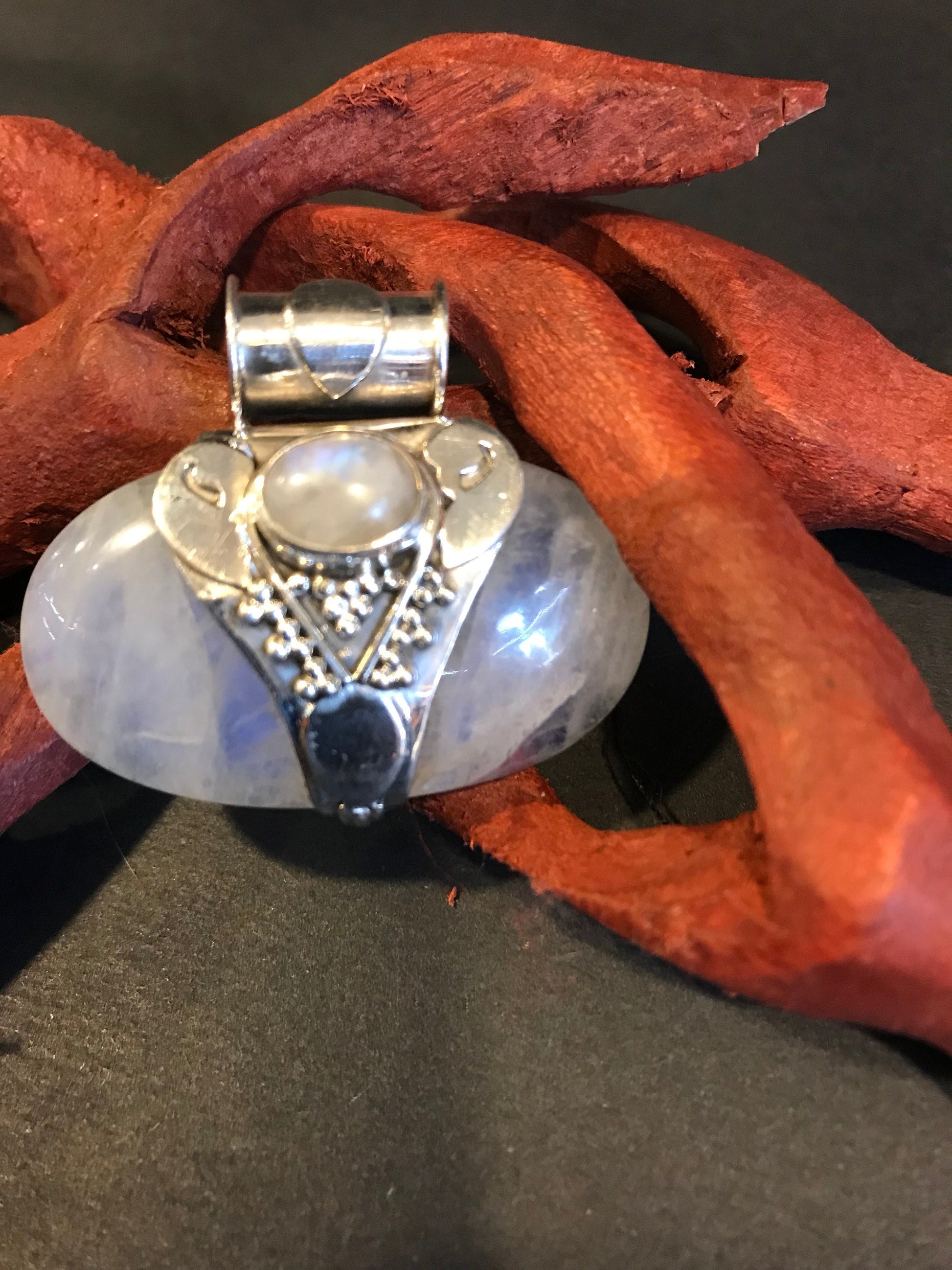 Rainbow moonstone pendent on sterling silver hand made in Nepal. meditation/mystery self-discovery/intuition