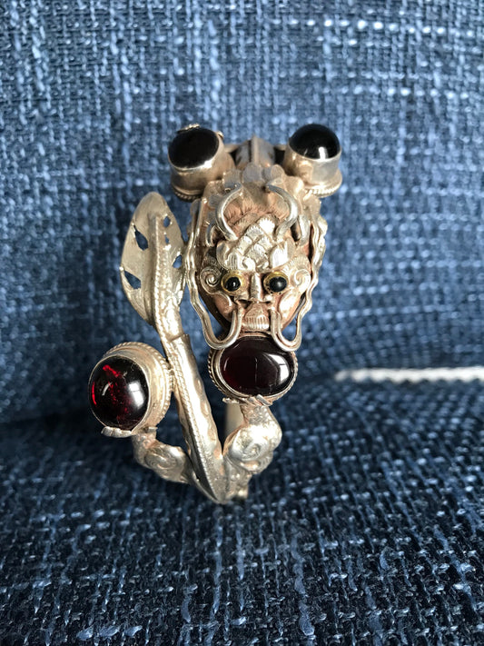 Sterling silver Dragon cuff bracelet, Handmade in Nepal, Dragon holding Garnet stone in his claws and mouth. wealth/good fortune/heroism