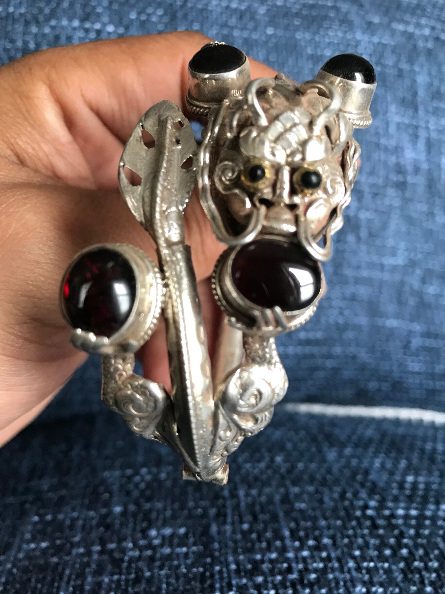 Sterling silver Dragon cuff bracelet, Handmade in Nepal, Dragon holding Garnet stone in his claws and mouth. wealth/good fortune/heroism