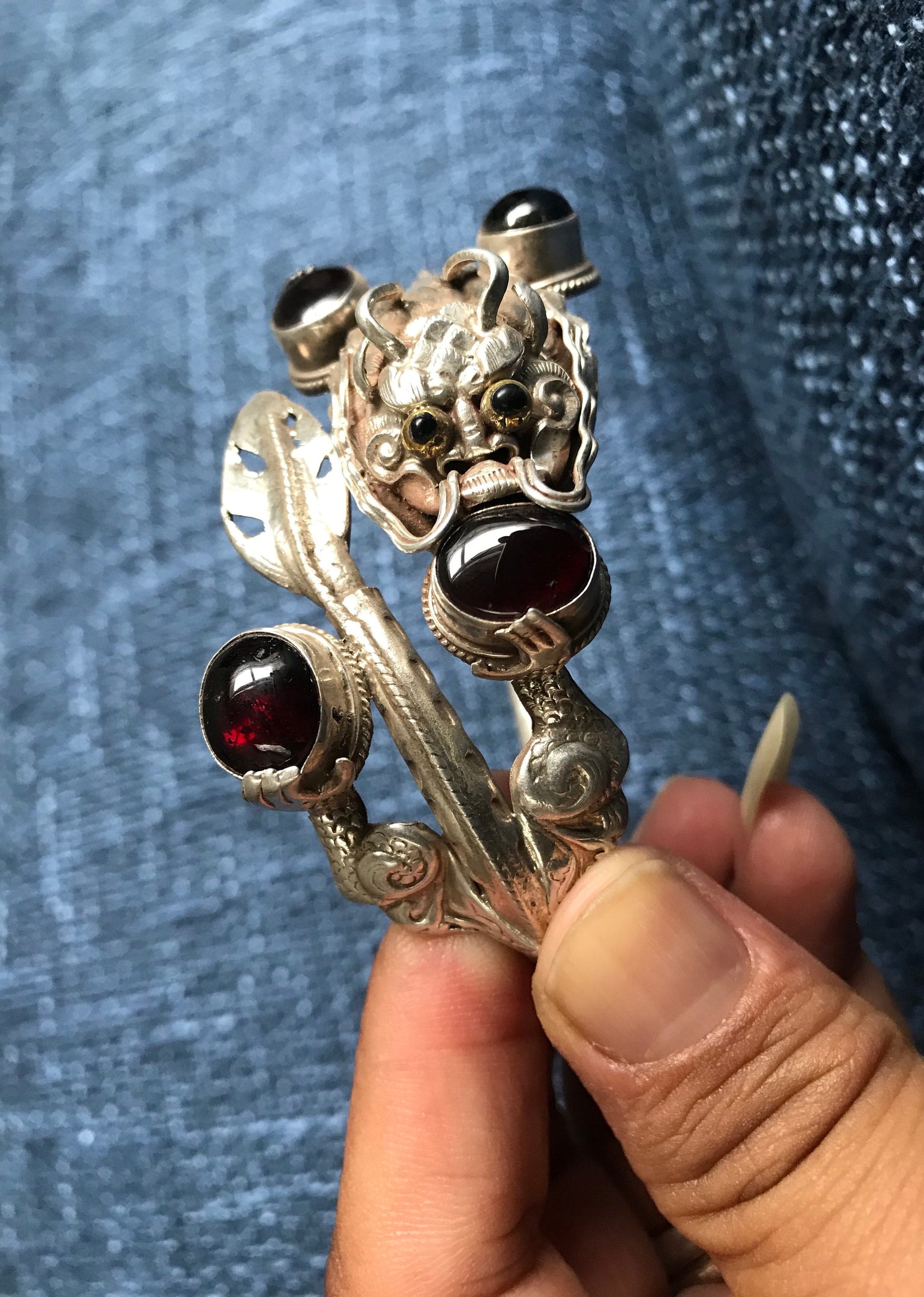 Sterling silver Dragon cuff bracelet, Handmade in Nepal, Dragon holding Garnet stone in his claws and mouth. wealth/good fortune/heroism